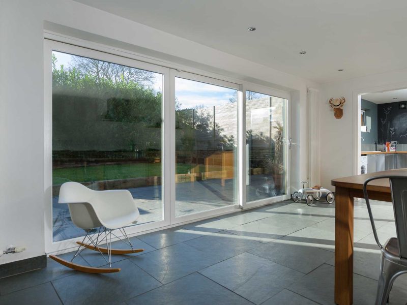 far away full view of white upvc patio sliding doors in a kitchen