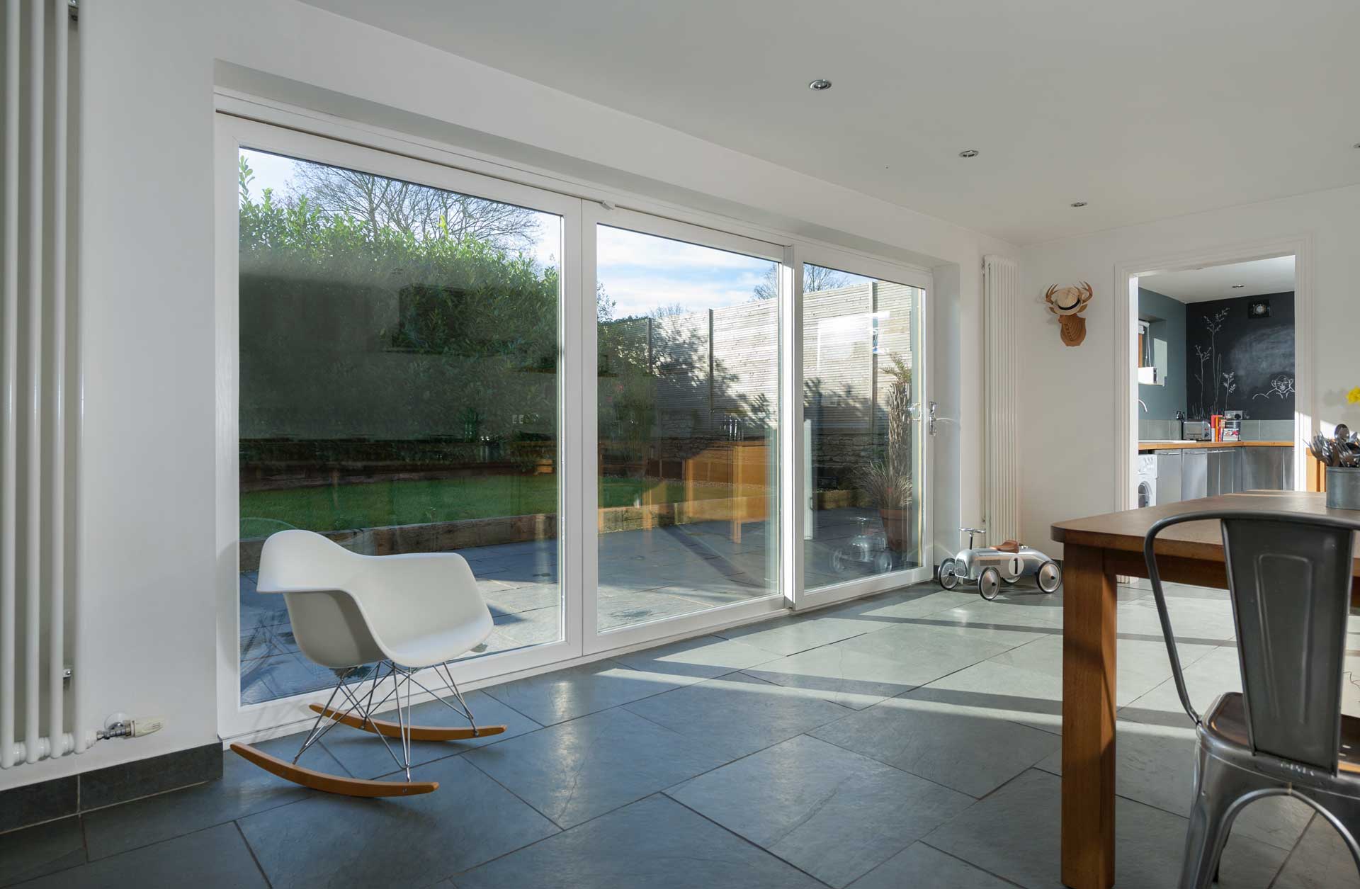 far away full view of white upvc patio sliding doors in a kitchen